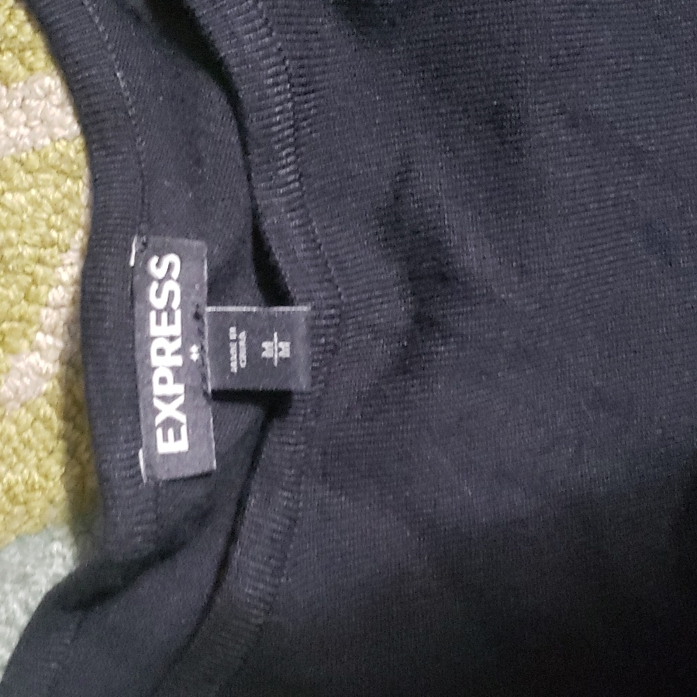 Black long sleeve. Express rouch dress. Midi. New, never used.